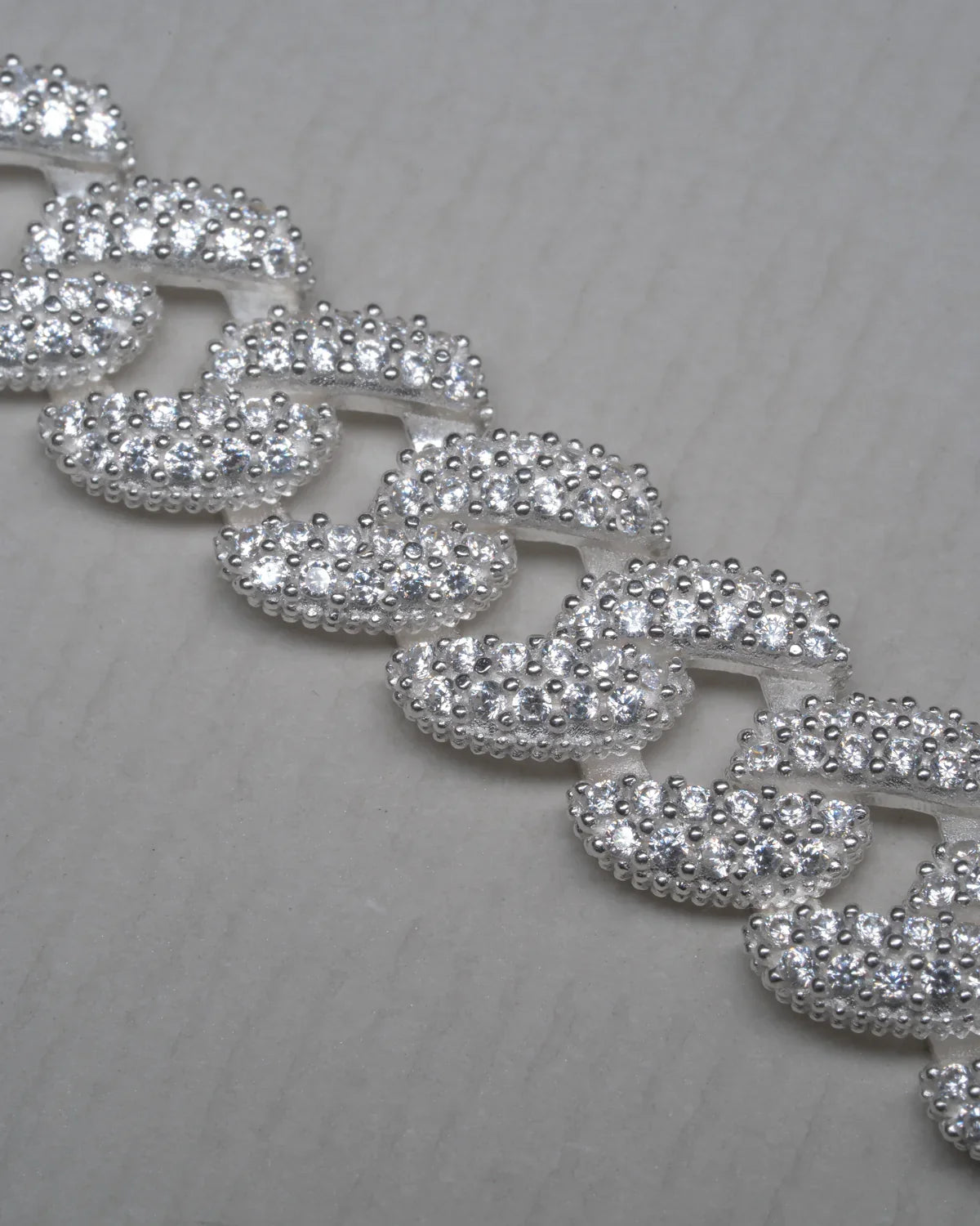 Iced-Out Cuban Link Bracelets and Chains in Men's Fashion