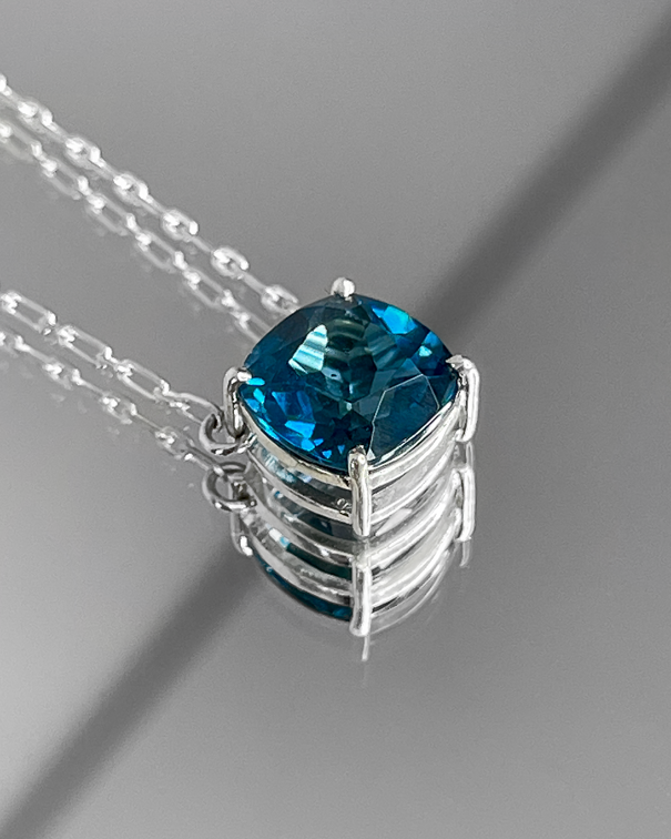 London Blue Topaz Cushion + 2 Diamonds Necklace – mirror reflection