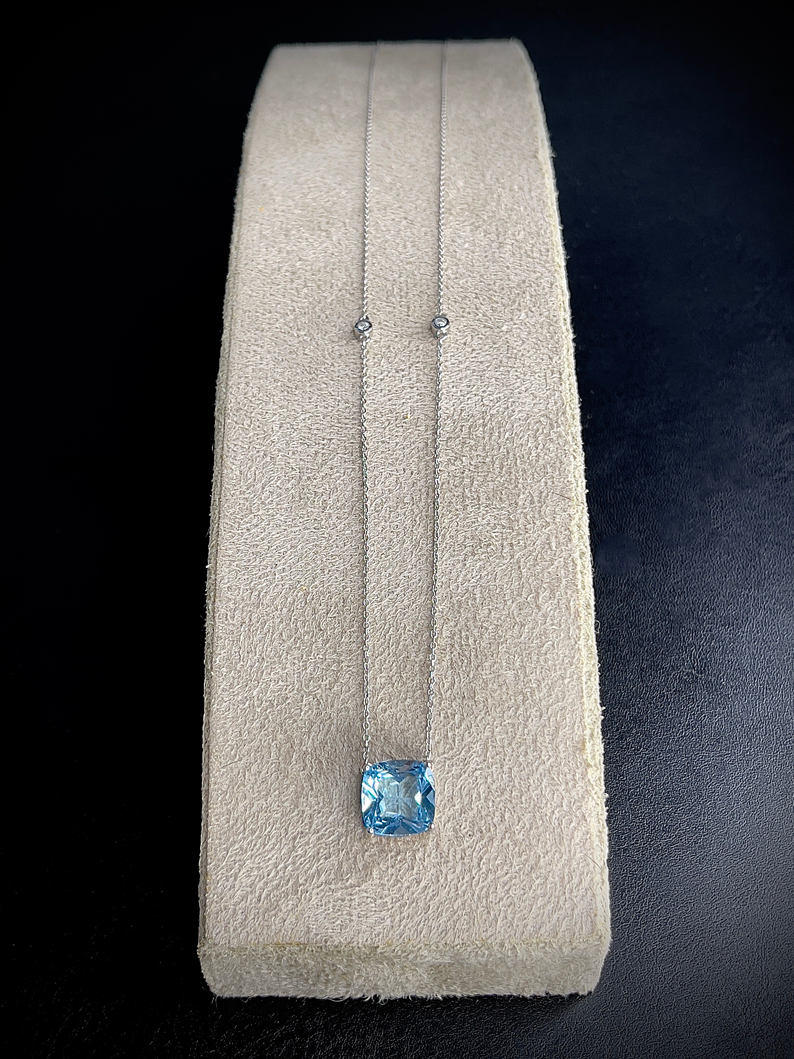 Sky Blue Topaz Cushion + 2 Diamonds Necklace in 18k white gold